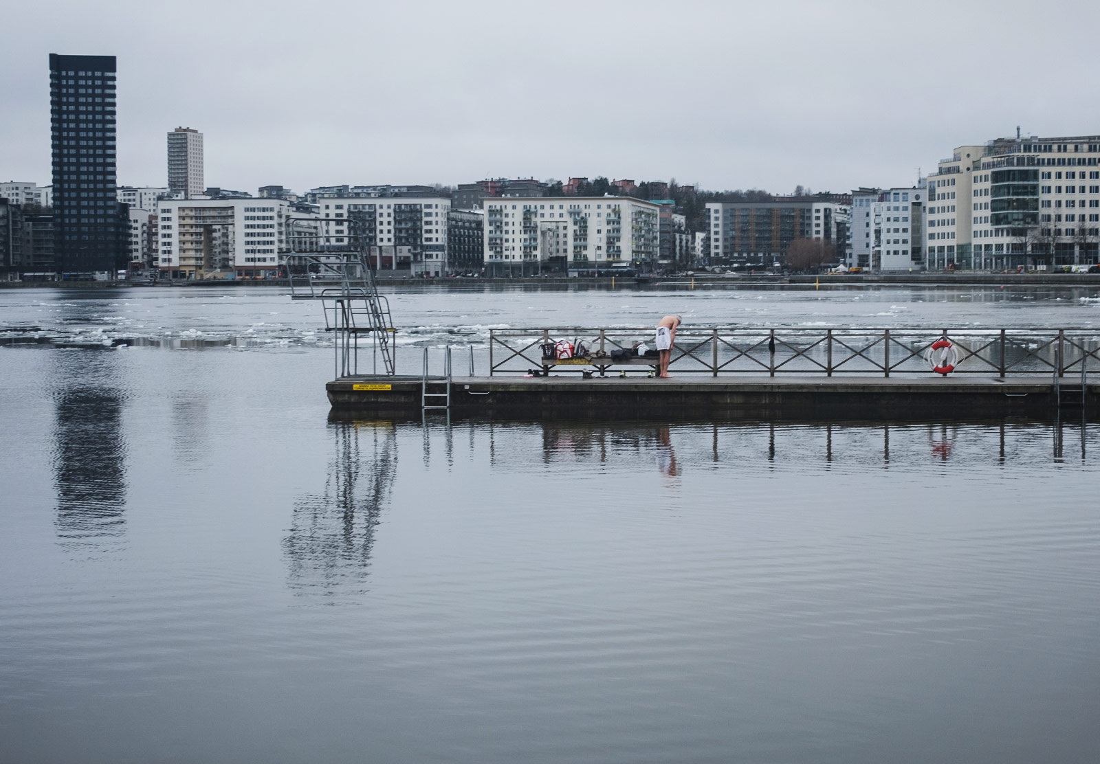 Person stood on swimming jetty