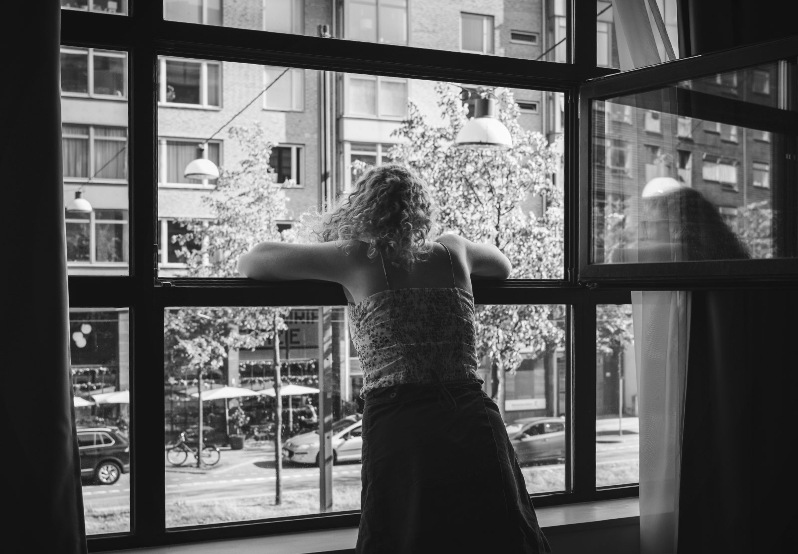 Woman leaning out of window