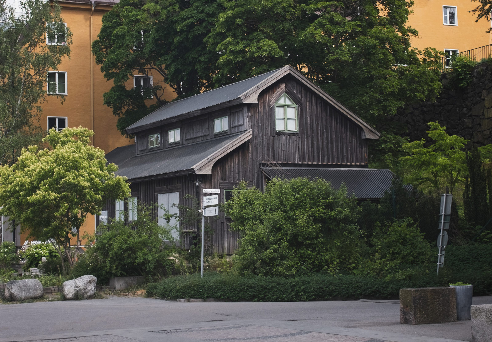 Old house next to new apartment building