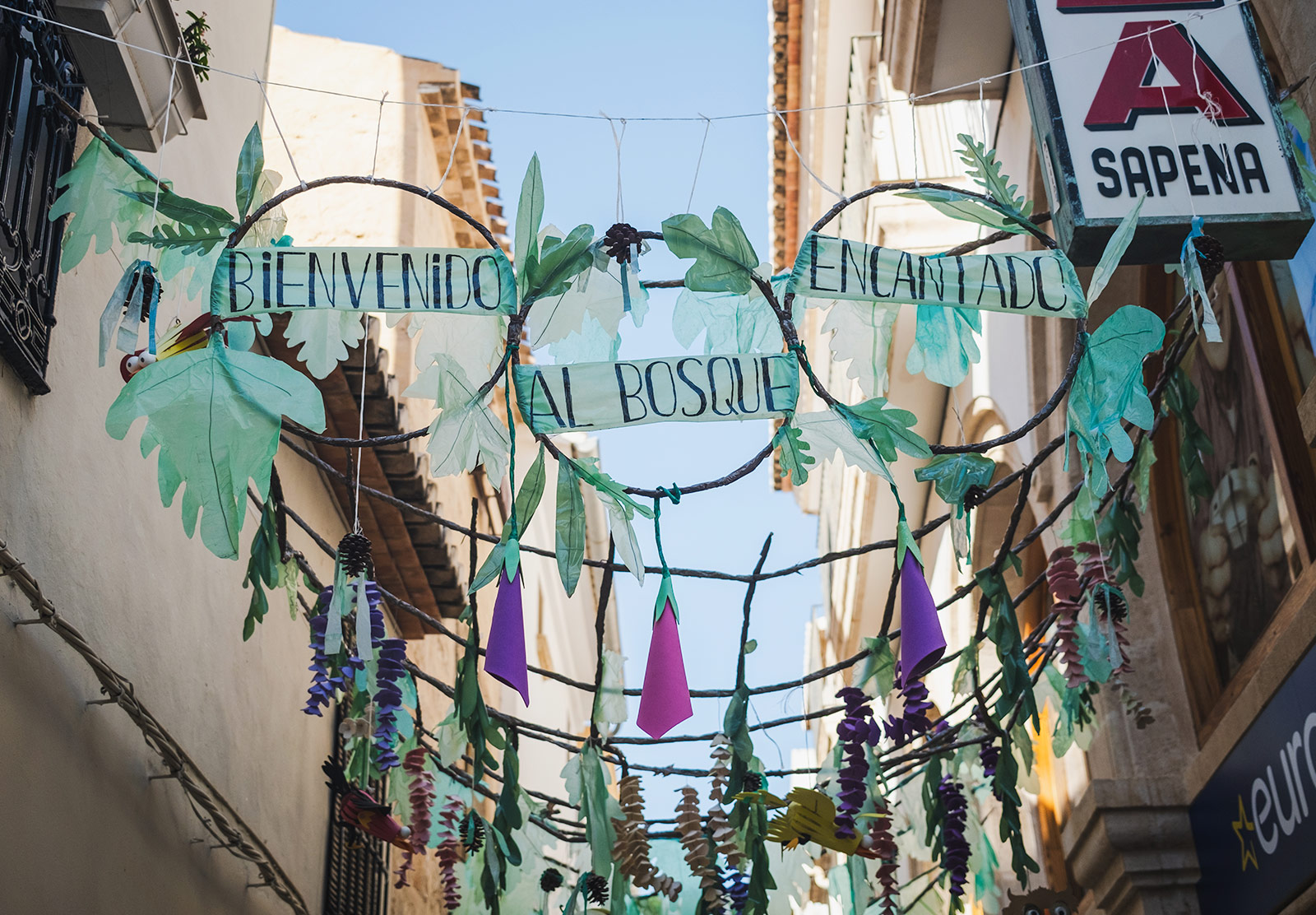 Fiesta decorations hung over street