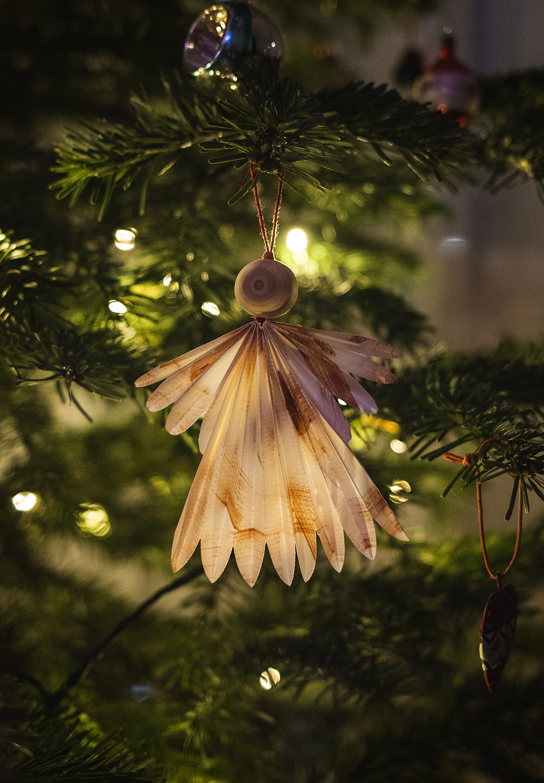 Paper angel on tree