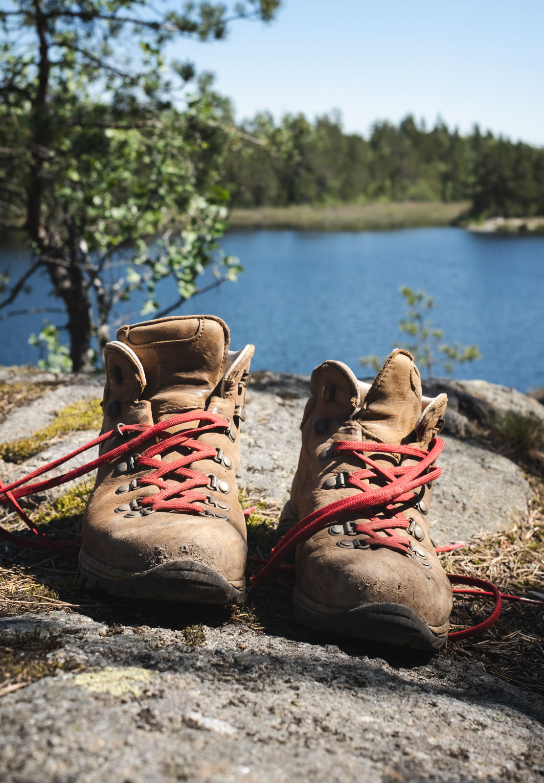 Boots resting on a rock