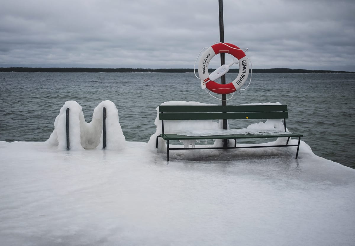 Ice covered bench and steps
