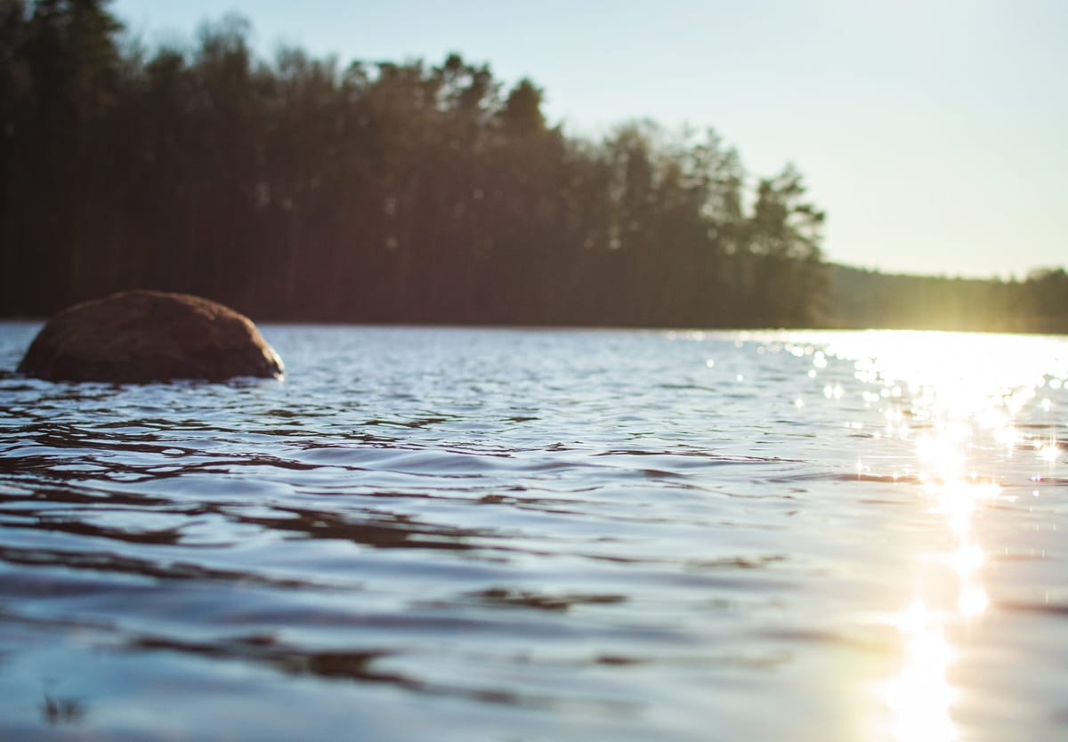 Sun shining on lake