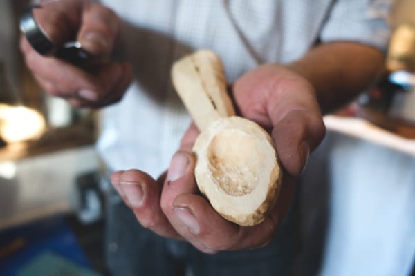 Wood carving in hand