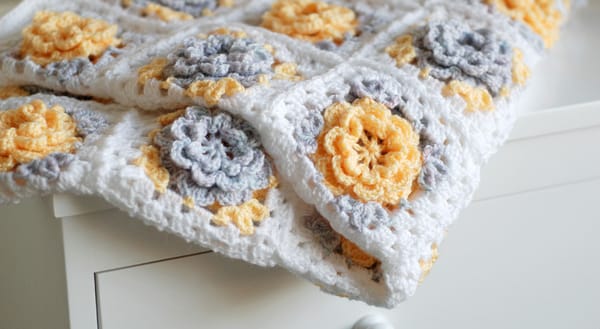 Yellow crochet flower blanket