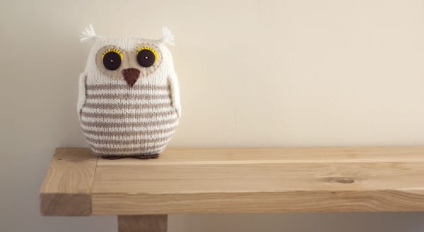 Knitted owl with stripes