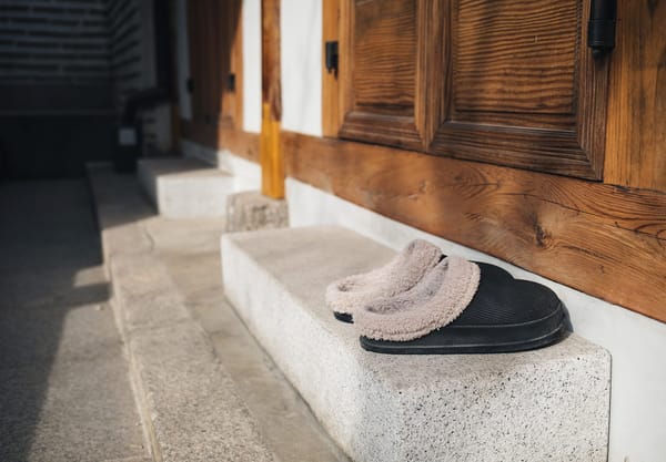 Slippers on stone step