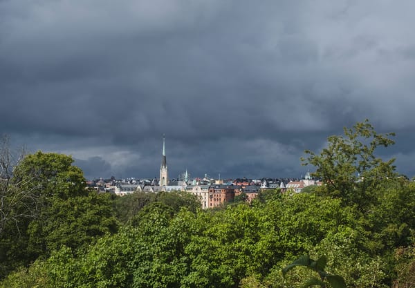 Dark clouds behind church