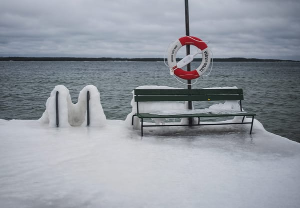 Ice covered bench and steps