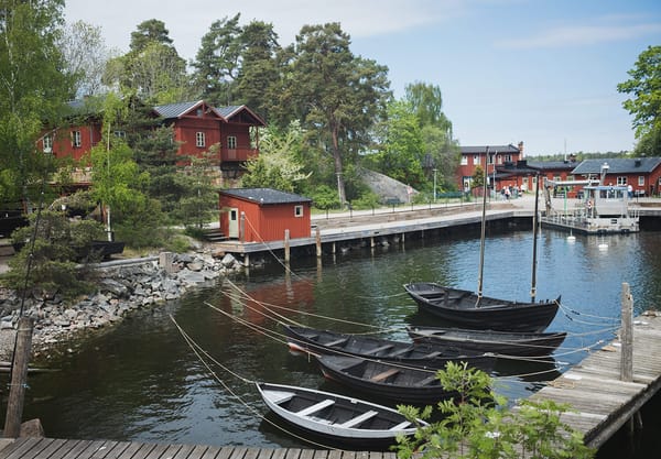 Boats tied up on the shore