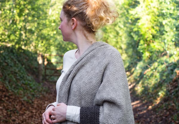Shawl draped over shoulder