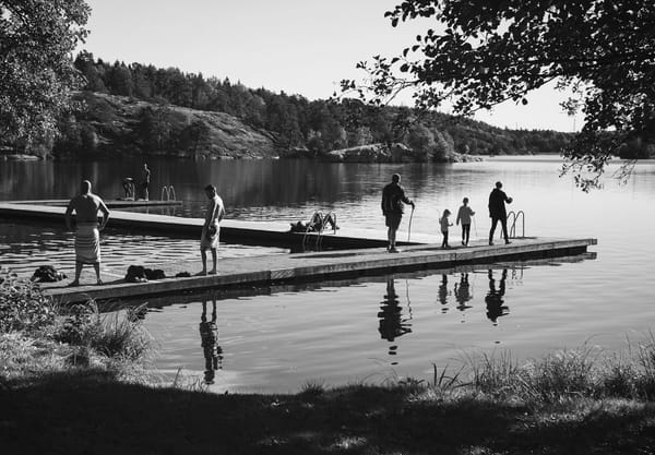 Swimmers on jetty