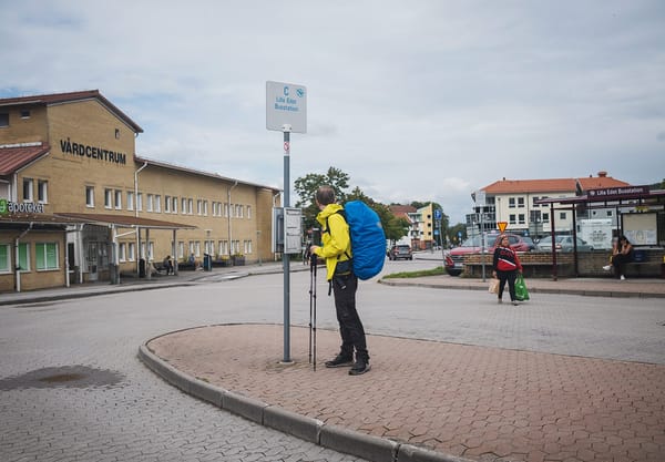 Man waiting at bus stop