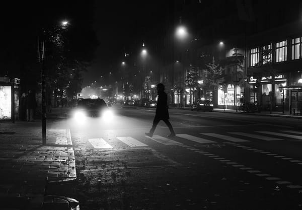 Headlights shining on person