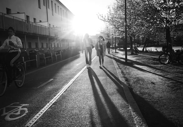 People walking in the sun